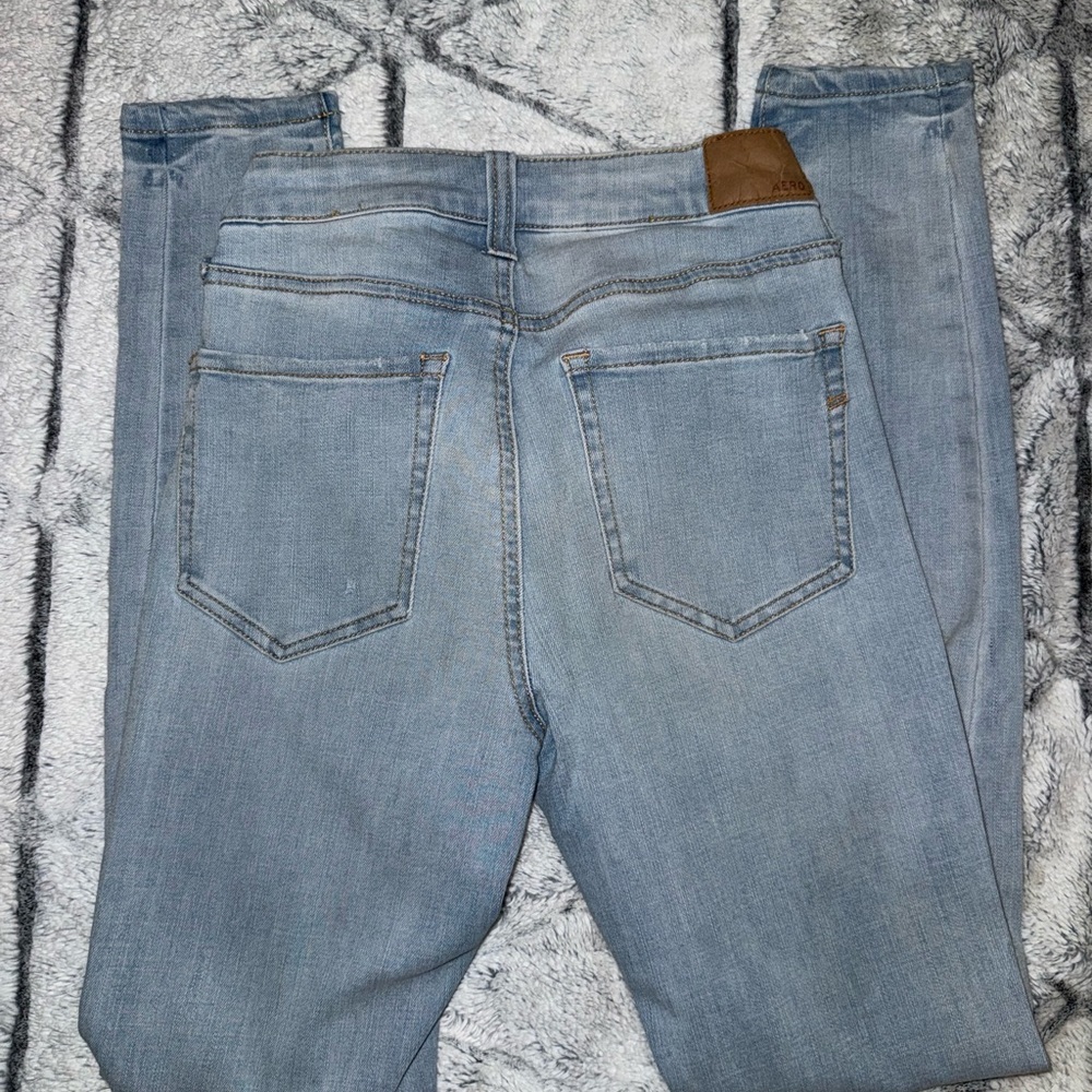 Blue Denim Jeans with Gold Stitching